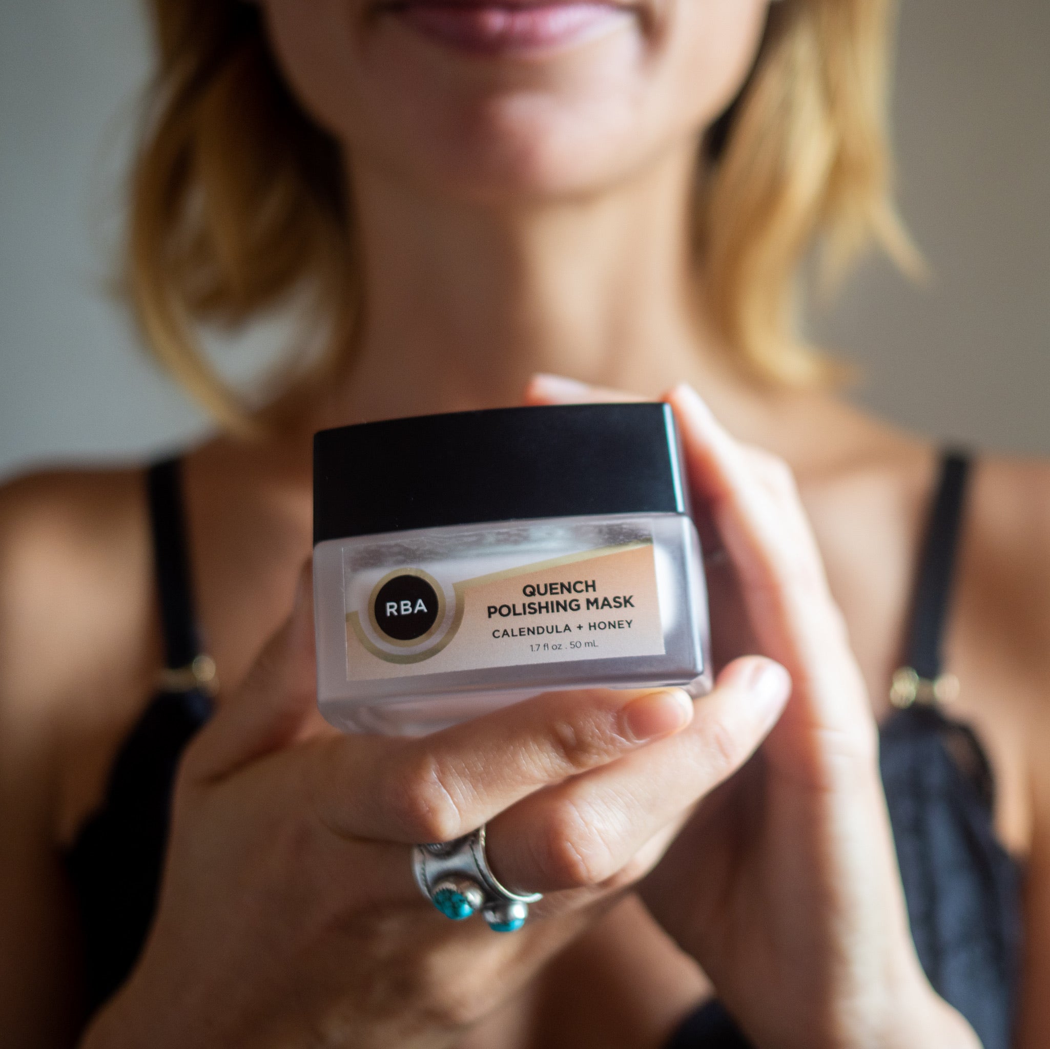 RBA Skincare Quench Polishing Mask in glass packaging heldhands